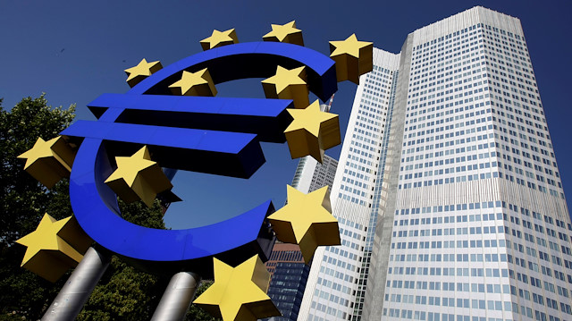 Outside view shows the Euro sculpture in front of the headquarters of the European Central Bank (ECB) in Frankfurt.