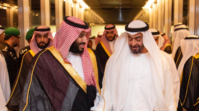 Saudi Crown Prince Mohammed bin Salman walks with Abu Dhabi's Crown Prince Sheikh Mohammed bin Zayed al-Nahyan during the Saudi-UAE Summit in Jeddah, Saudi Arabia, June 6, 2018. 