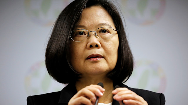 Taiwan tells China to use peaceful means to resolve differences