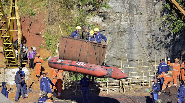 Indian Navy personnel come out of a coal mine during a rescue operation in Ksan, in the northeastern state of Meghalaya, India, December 31, 2018. 