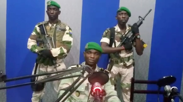 A still image taken from a video posted on January 7, 2019, shows military officers giving a statement from a radio station in Libreville, Gabon. 