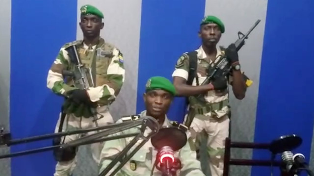 A still image taken from a video posted on January 7, 2019, shows military officers giving a statement from a radio station in Libreville, Gabon