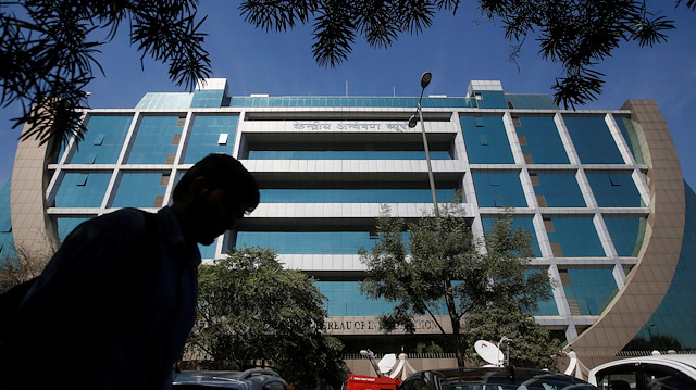 A man walks past India's Central Bureau of Investigation (CBI) headquarters building in New Delhi, India.