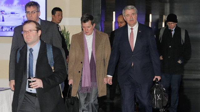 Ted McKinney (2nd R), the U.S. undersecretary for trade and foreign agricultural affairs and a member of the U.S. trade delegation to China, leaves a hotel with other officials in Beijing, China January 7, 2019. 