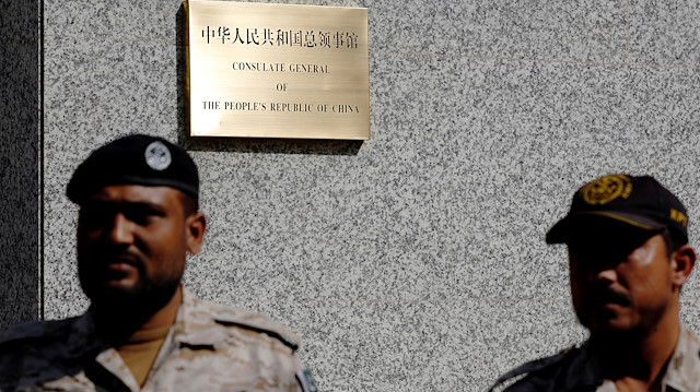 Paramilitary soldiers stand guard outside, after an attack on the Chinese consulate, in Karachi, Pakistan 