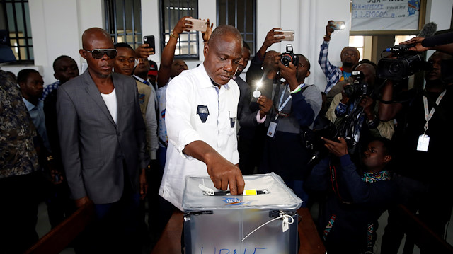 Martin Fayulu, Congolese joint opposition Presidential candidate, casts his vote at a polling station in Kinshasa, Democratic Republic of Congo.