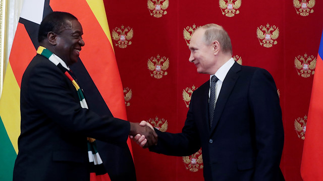 Russia's President Vladimir Putin (R) shakes hands with his Zimbabwean counterpart Emmerson Mnangagwa during a signing ceremony at the Kremlin in Moscow, Russia January 15, 2019. 