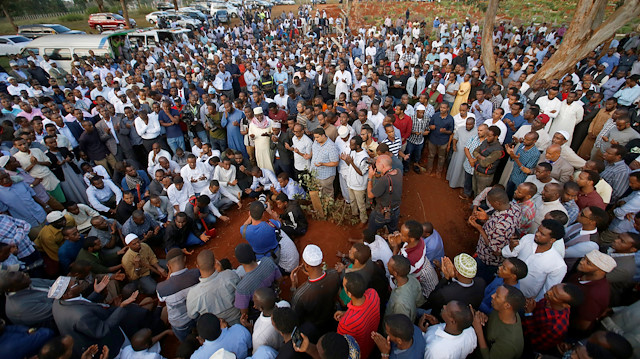 People pray during the funeral of Feisal Ahmed Rashid and Abdallah Mohamed Dahir who were killed in an attack on an upscale hotel compound, at the Langata Muslim cemetery, in Nairobi, Kenya January 16, 2019. 