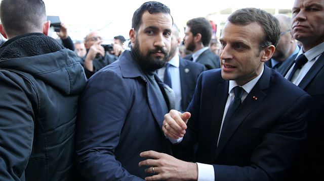 File photo: Elysee senior security officer Alexandre Benalla stands next to French President Emmanuel Macron during a visit to the Paris International Agricultural Show (Salon de l'Agriculture) in Paris, France, February 24, 2018. Picture taken February 24, 2018. 