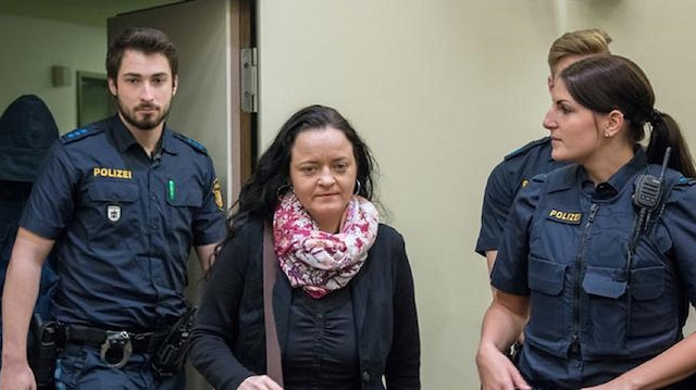 Beate Zschäpe, the defendant in the murder trial, enters court on the 402nd day of proceedings.