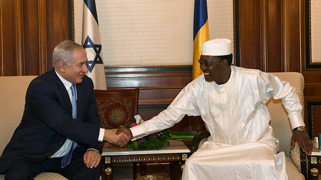 Israeli Prime Minister Benjamin Netanyahu shakes hands with Chad's President Idriss Deby