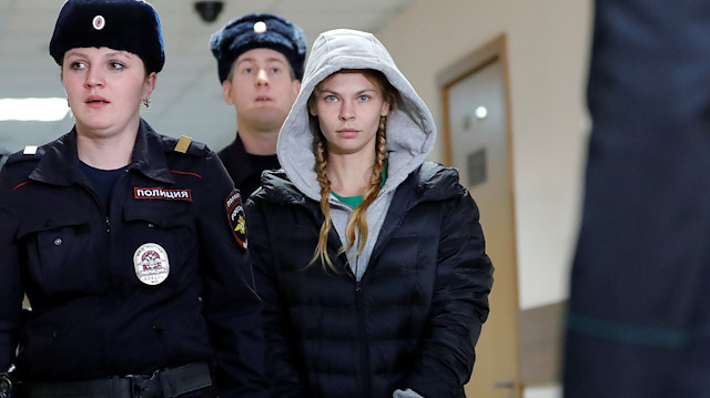 Model Anastasia Vashukevich, also known as Nastya Rybka, who was deported from Thailand to Russia after her arrest and pleading guilty to charges including conspiracy and soliciting, is escorted before a court hearing in Moscow, Russia January 19, 2019