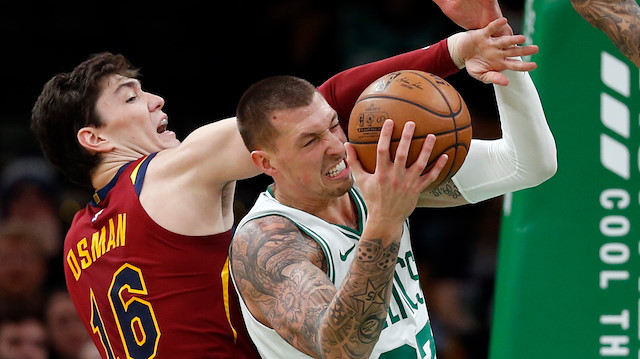Jan 23, 2019; Boston, MA, USA; Boston Celtics center Daniel Theis (27) is guarded by Cleveland Cavaliers forward Cedi Osman (16) during the second half at TD Garden