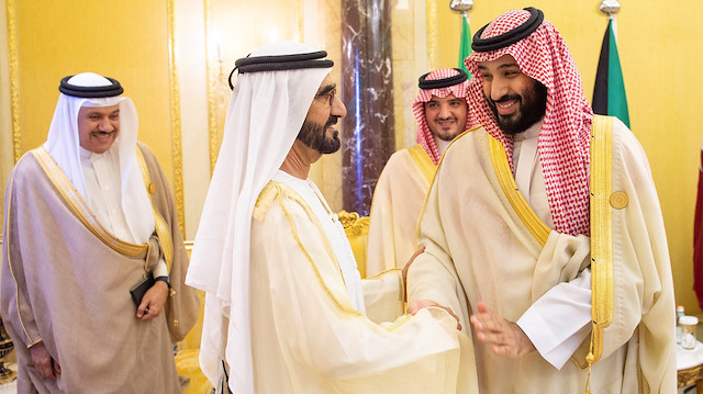 Saudi Arabia's Crown Prince Mohammed bin Salman shakes hands with Prime Minister and Vice-President of the United Arab Emirates and ruler of Dubai Sheikh Mohammed bin Rashid al-Maktoum during the Gulf Cooperation Council's (GCC) Summit in Riyadh, Saudi Arabia December 9, 2018. Bandar Algaloud/Courtesy of Saudi Royal Court/Handout via REUTERS ATTENTION EDITORS - THIS PICTURE WAS PROVIDED BY A THIRD PARTY

