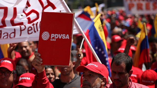 Supporters of Venezuela's President Nicolas Maduro attend a rally in support of the state oil company