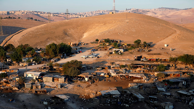  A general view shows the main part of a Palestinian Bedouin village
