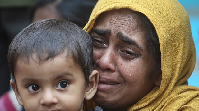 A Rohingya Muslim woman cries as she holds her daughter after they were detained by Border Security Force (BSF) soldiers while crossing the India-Bangladesh border from Bangladesh, at Raimura village on the outskirts of Agartala, January 22, 2019. REUTERS/Jayanta Dey

