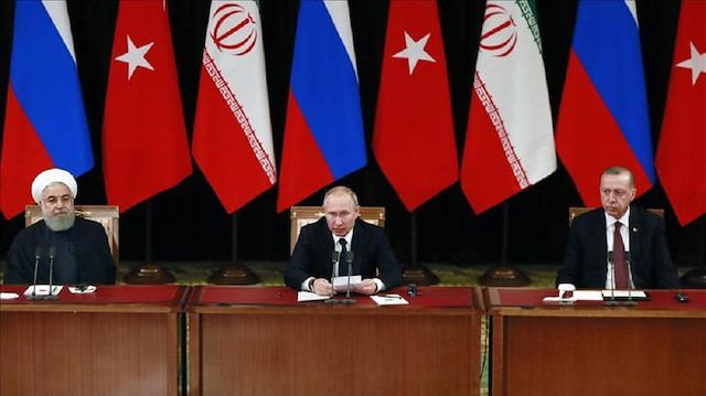  Iran's President Hassan Rouhani, Russia's President Vladimir Putin and Turkey's President Recep Tayyip Erdoğan.