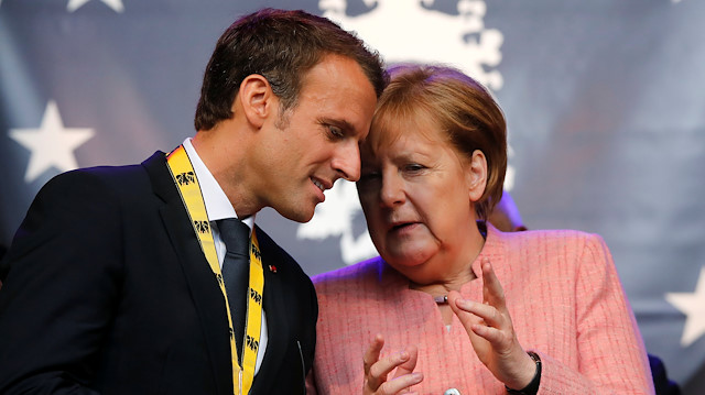 File photo: German Chancellor Angela Merkel and French President Emmanuel Macron
