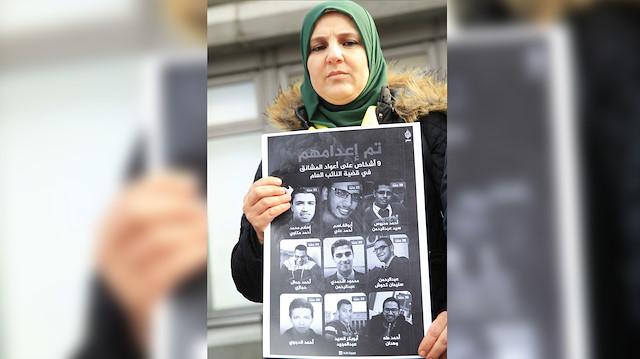 20 Şubat günü idam edilen 9 gencin fotoğraflarının olduğu poster.