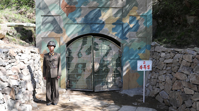 File photo: A North Korean soldier stands guard in front of the second tunnel of Punggye-ri nuclear test ground before it is blown up during the dismantlement process in Punggye-ri, North Hamgyong Province, North Korea May 24, 2018. 