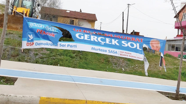 DSP Pendik Belediye Başkan Adayı Murtaza Sasa'nın kesilen pankartı.