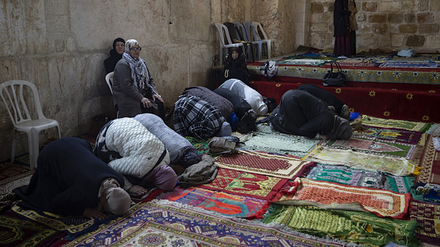 Palestinians perform prayer at Bab al-Rahma masjid

