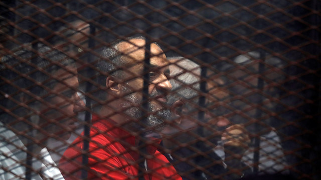 Muslim Brotherhood's senior member Mohamed El-Beltagy is seen behind bars 