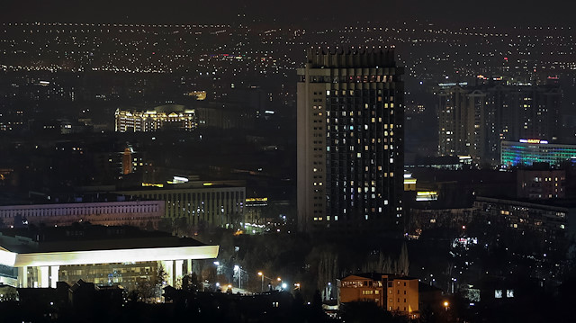 The hotel "Kazakhstan" is seen after the lights are switched off for Earth Hour in Almaty, Kazakhstan, March 30, 2019