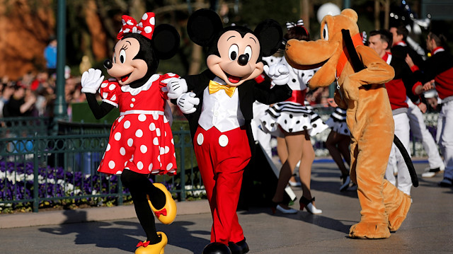 FILE PHOTO: Disney characters Mickey Mouse and Minnie Mouse attend the 25th anniversary of Disneyland Paris at the park in Marne-la-Vallee, near Paris, France, April 12, 2017. REUTERS/Benoit Tessier/File Photo

