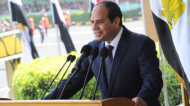 Egypt President Abdel Fattah al-Sisi delivers a speech during a graduation ceremony at the Egyptian Military Academy in Cairo, June 24, 2014. Sisi pledged on Tuesday to give up half his salary and property and called on the Egyptian people to make similar sacrifices in a bid to prepare the public for a period of painful economic austerity. Egypt's economy is forecast to grow just 3.2 percent in the fiscal year that begins on July 1, well below the level needed to create enough jobs for its rapidly growing population of 86 million and alleviate widespread poverty .REUTERS/
