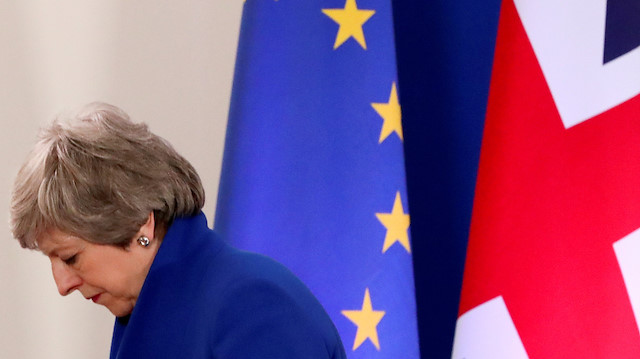 British Prime Minister Theresa May leaves after a news conference following an extraordinary European Union leaders summit to discuss Brexit, in Brussels, Belgium April 11, 2019. 