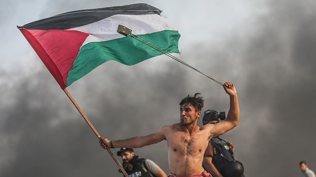مصور "الأناضول" بغزة يفوز بـ 4 جوائز خلال 2019