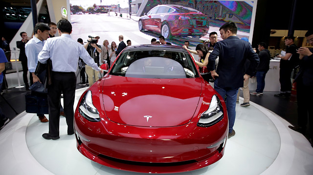 FILE PHOTO: A Tesla Model 3 car is displayed during a media preview at the Auto China 2018 motor show in Beijing, China April 25, 2018. REUTERS/Jason Lee/File Photo

