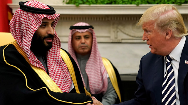 FILE PHOTO: U.S. President Donald Trump shakes hands with Saudi Arabia's Crown Prince Mohammed bin Salman in the Oval Office at the White House in Washington, U.S. March 20, 2018. REUTERS/Jonathan Ernst/File Photo

