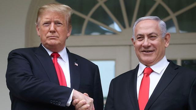 File photo: U.S. President Donald Trump shakes hands with Israel's Prime Minister 