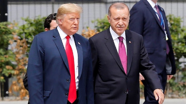 File photo: U.S. President Donald Trump speaks with Turkey's President Recep Tayyip Erdoğan