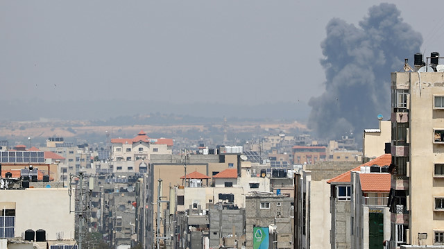 Smoke rises following an Israeli air strike in Gaza 