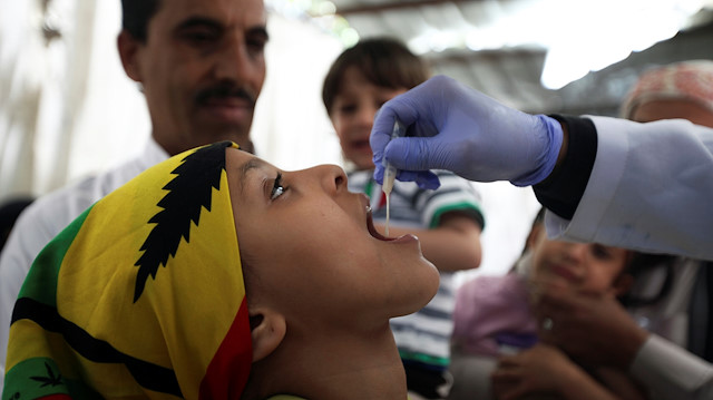 File photo: A girl receives a cholera vaccination during a house-to-house immunization campaign in Sanaa, Yemen 
