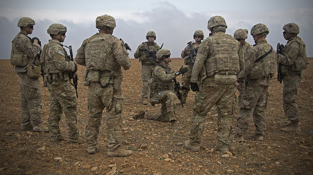 ABD Irak'tan 'acil durumda çalışmayan' personelini çekiyor.