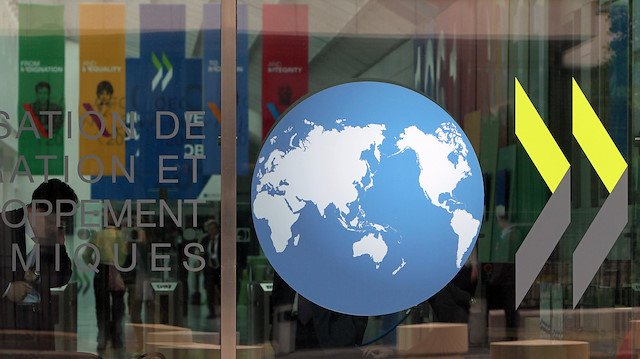 OECD küresel büyüme öngörüsünü yüzde 3.2’ye düşürdü.