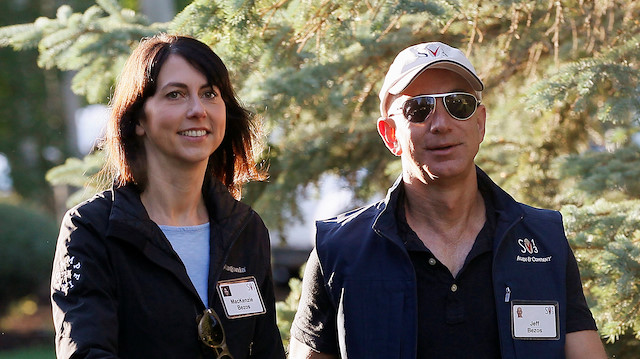 File photo: Amazon CEO Jeff Bezos (R) and MacKenzie Bezos 