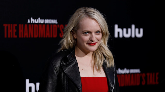 Cast member Elisabeth Moss poses at the premiere for the second season of the television series "The Handmaid's Tale" in Los Angeles, California, U.S., April19, 2018. REUTERS/Mario Anzuoni

