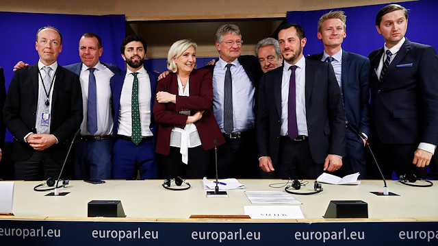 Finnish MEP Jussi Halla-Aho, Austrian MEP Harald Vilimsky, Italian MEP Marco Zanni, French far-right National Rally (Rassemblement National) party leader Marine Le Pen, German MEP Jorg Meuthen, Belgian MEP Gerolf Annemans, French MEP Nicolas Bay, Danish MEP Peter Kofod and Estonian MEP Jaak Madison pose after a joint news conference on the formation of a new far-right European Parliament group to represent nationalists' interests at the EU Parliament in Brussels, Belgium
