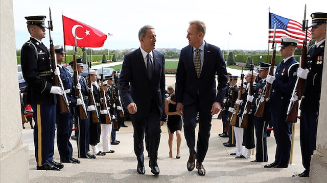 Hulusi Akar, Turkey’s national defense minister, and Patrick Shanahan, the acting U.S. defense secretary