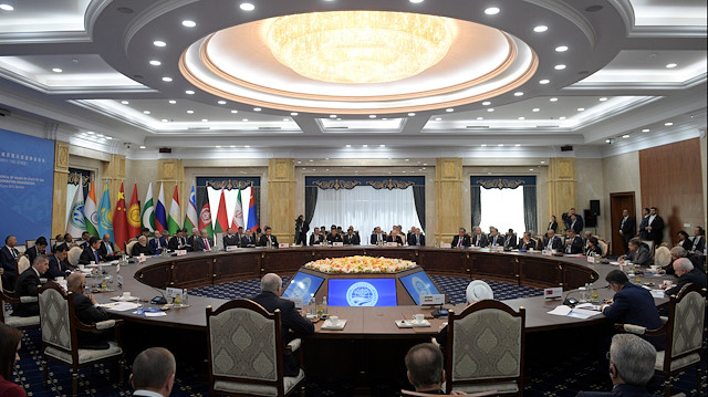 Leaders of the Shanghai Cooperation Organisation (SCO) countries and observer members attend a session during the SCO summit in Bishkek, Kyrgyzstan June 14, 2019.