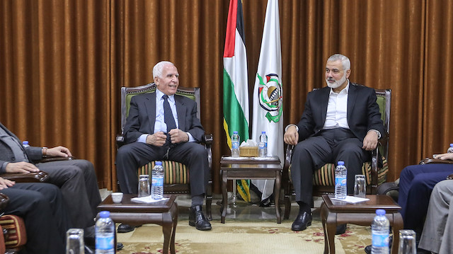 FKÖ Merkez Komite üyesi Azzam el-Ahmed (solda) Hamas Siyasi Büro Başkanı Heniyye (sağda)