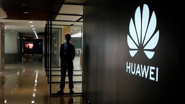 File photo: A Huawei company logo is seen at a shopping mall in Shanghai