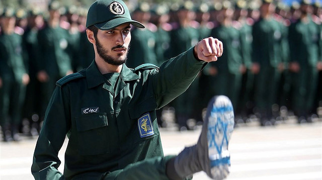 An Iranian Officer of Revolutionary Guards, with Israel flag drawn on his boots