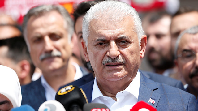 Binali Yildirim, mayoral candidate of the ruling AK Party, speaks outside a polling station in Istanbul, Turkey, June 23, 2019. REUTERS/Kemal Aslan  